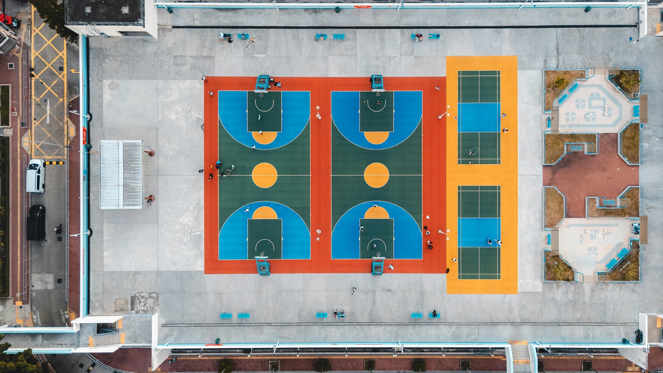 Residential sport court with painted court striping and equipment